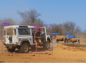 A person sitting on a truck

AI-generated content may be incorrect.